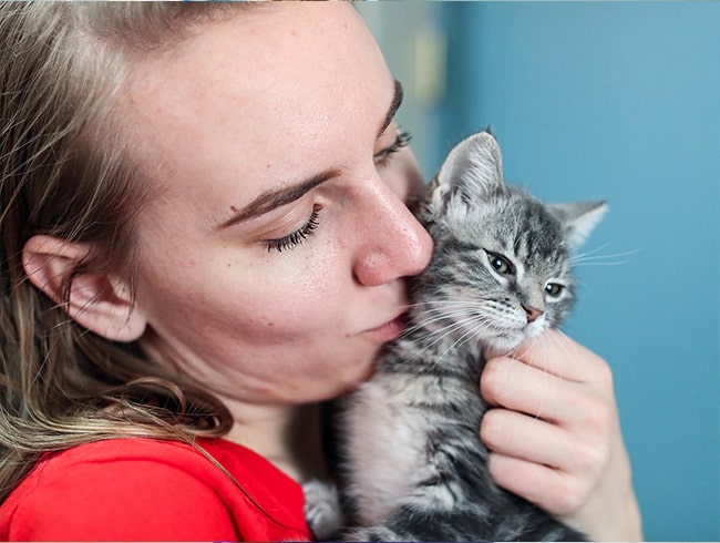 Woman with kitten